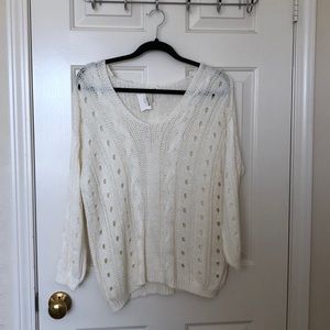 Cream sweater brand new with tags.